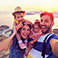 Family smiling on vacation.