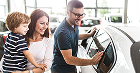 Family buying a new car.