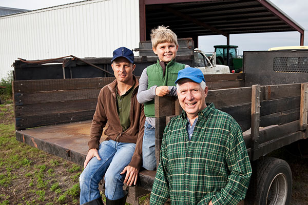 Business farmer with his family.