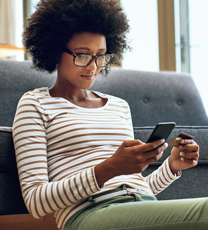 Person using their phone to look at free checking accounts.