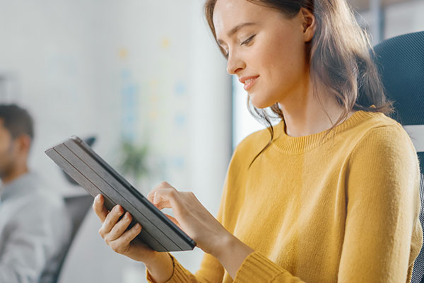 Person checking their balance on their tablet.