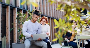 Young adults looking at computer image