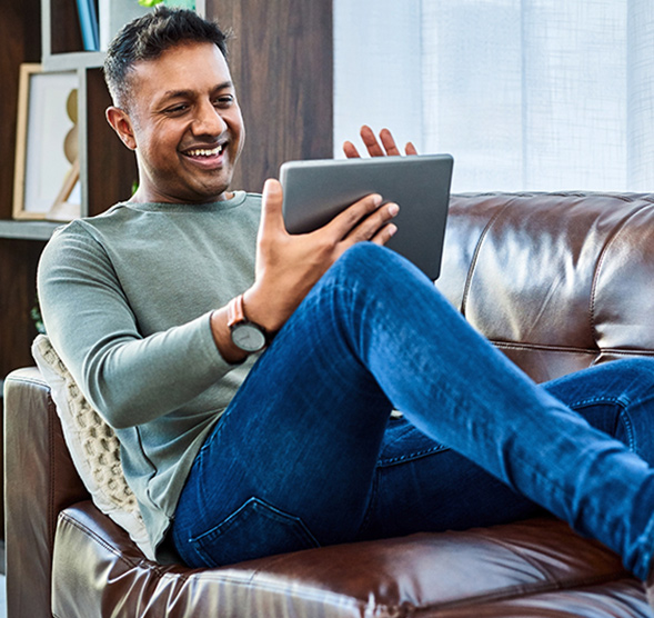 Person checking their estatements on their tablet.