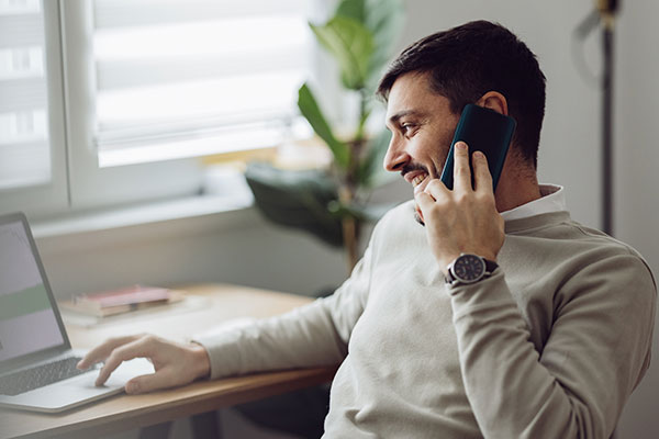 Person using their phone to call their bank.